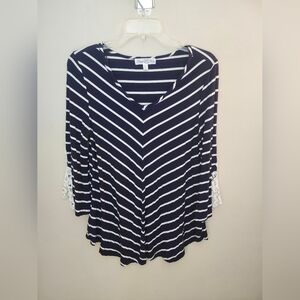 Navy and white stripped 3/4 sleeve top with embroidery accents